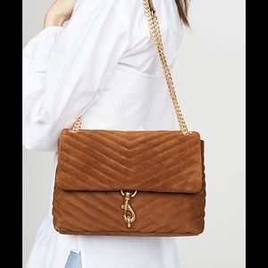 Used a few times. Rebecca minkoff suede cross body